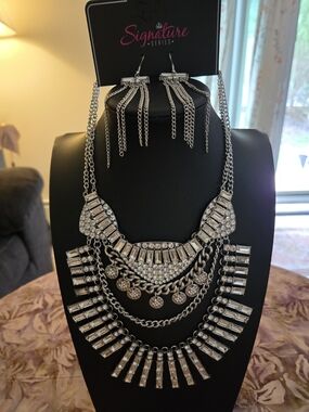 The Nedra 2023 Paparazzi Z Silver Statement Necklace & Earrings Set